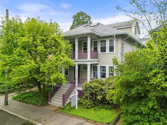 97 Stearns Rd, Brookline, MA 02446 - view of front of house featuring a balcony and roof with shingles
