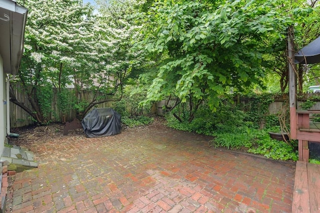 97 Stearns Rd, Brookline, MA 02446 - fenced backyard featuring a patio