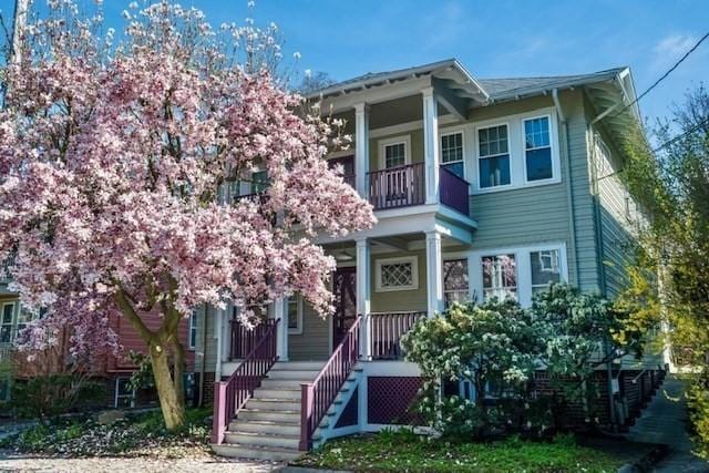 97 Stearns Rd, Brookline, MA 02446 - view of front facade featuring a balcony and a porch