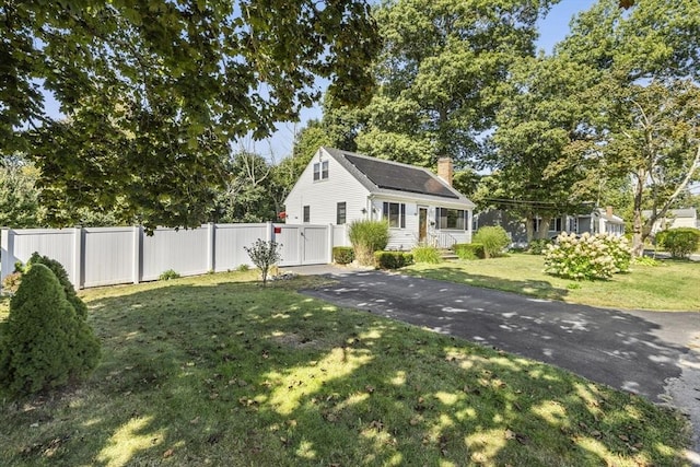 exterior space featuring a front lawn