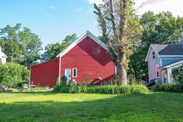 217 Asbury St, Hamilton, MA 01982 - view of side of home featuring a lawn