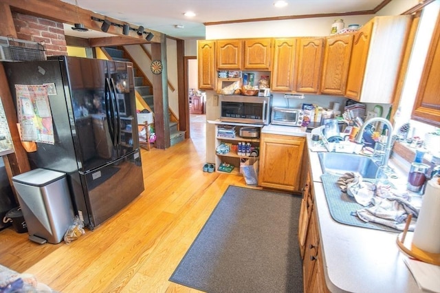 217 Asbury St, Hamilton, MA 01982 - kitchen featuring freestanding refrigerator, open shelves, stainless steel microwave, light wood-style floors, and light countertops
