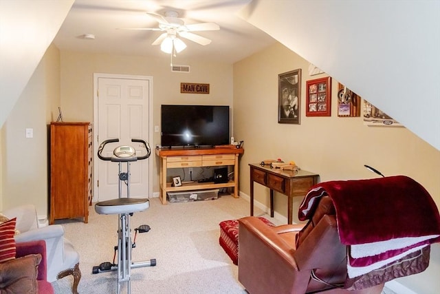 living room with carpet floors, ceiling fan, baseboards, and visible vents