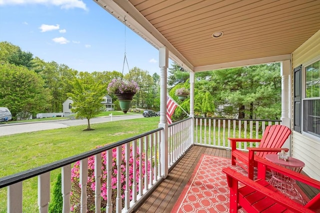 balcony featuring covered porch