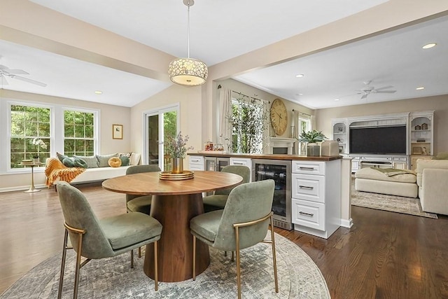 132 Hemmingway Pl, Wrentham, MA 02093 - dining area with wine cooler, ceiling fan, dark wood-style floors, recessed lighting, and baseboards