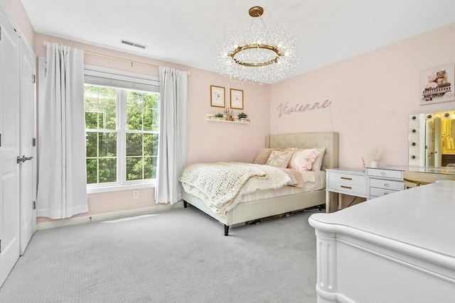132 Hemmingway Pl, Wrentham, MA 02093 - bedroom with light carpet and a chandelier