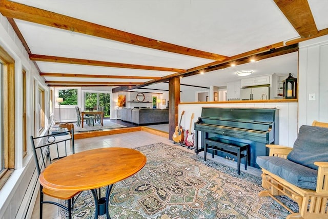 26 Beacon St, Amesbury, MA 01913 - living room featuring beam ceiling, tile patterned flooring, and a fireplace