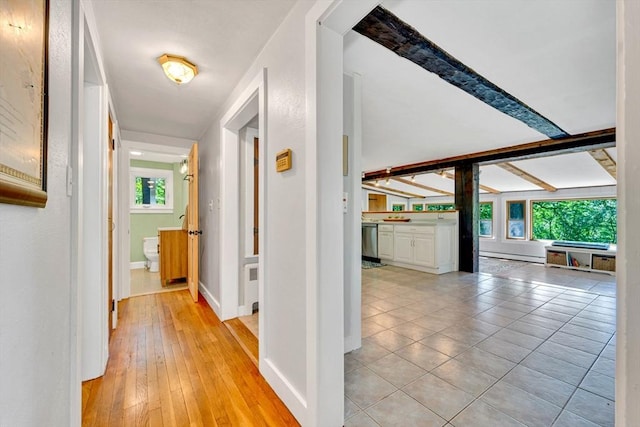 26 Beacon St, Amesbury, MA 01913 - hallway with baseboard heating and baseboards