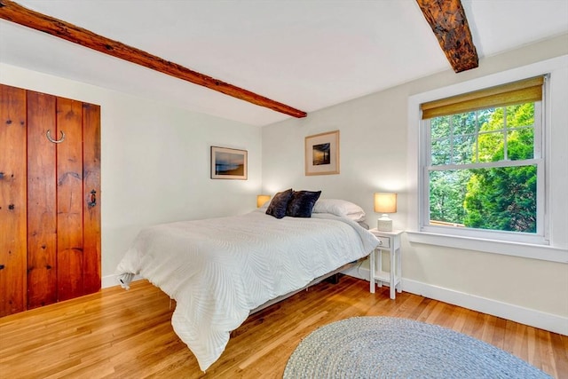 26 Beacon St, Amesbury, MA 01913 - bedroom featuring beamed ceiling and wood finished floors
