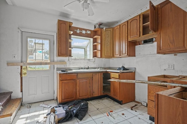 kitchen with ceiling fan and sink