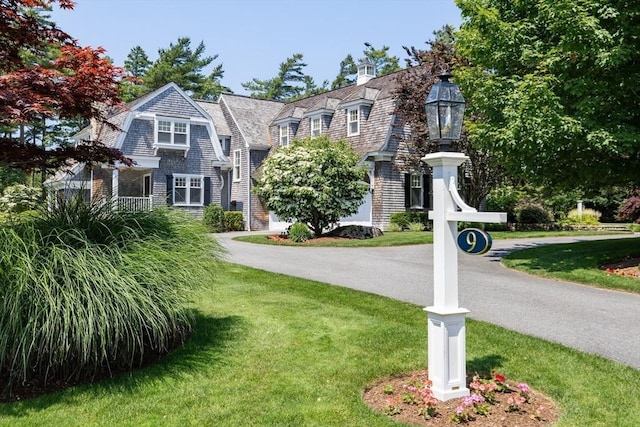 9 High Ridge Dr, Mattapoisett, MA 02739 - shingle-style home with a front lawn and a gambrel roof