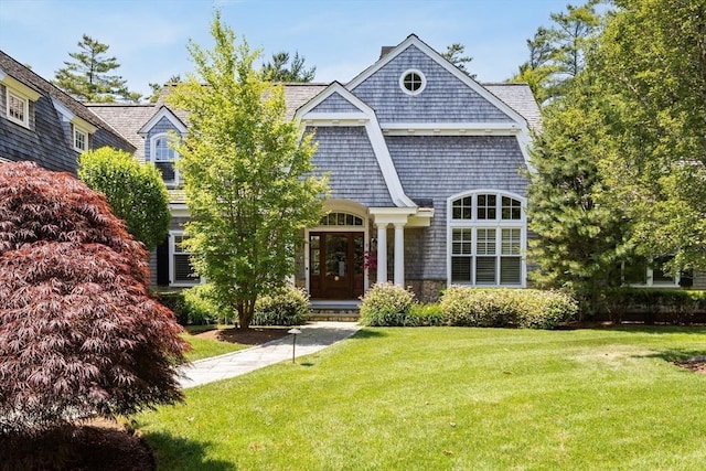 9 High Ridge Dr, Mattapoisett, MA 02739 - shingle-style home with a front lawn and a chimney