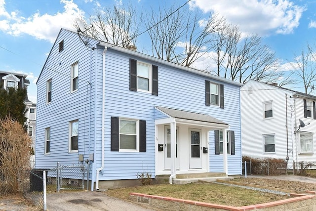 view of front of house with fence