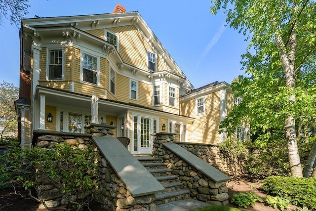 back of house with a porch