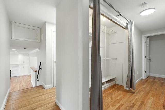 15 Oak Bluff Cir, East Longmeadow, MA 01028 - corridor with an upstairs landing and light wood-style floors