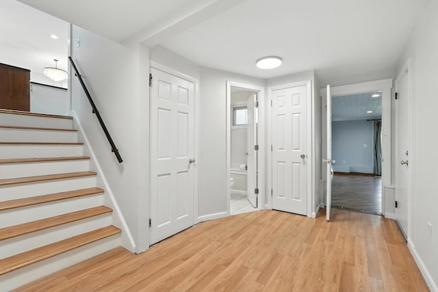 15 Oak Bluff Cir, East Longmeadow, MA 01028 - staircase featuring wood finished floors and baseboards
