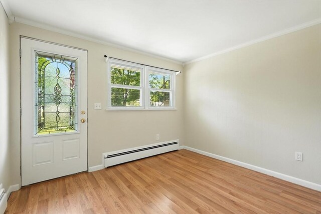 15 Oak Bluff Cir, East Longmeadow, MA 01028 - entryway featuring a baseboard radiator, ornamental molding, plenty of natural light, light wood finished floors, and baseboard heating