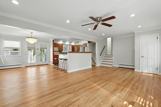 15 Oak Bluff Cir, East Longmeadow, MA 01028 - unfurnished living room featuring a baseboard radiator, light wood-type flooring, recessed lighting, a ceiling fan, and stairway