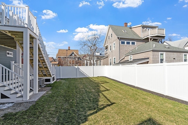 view of yard featuring a wooden deck