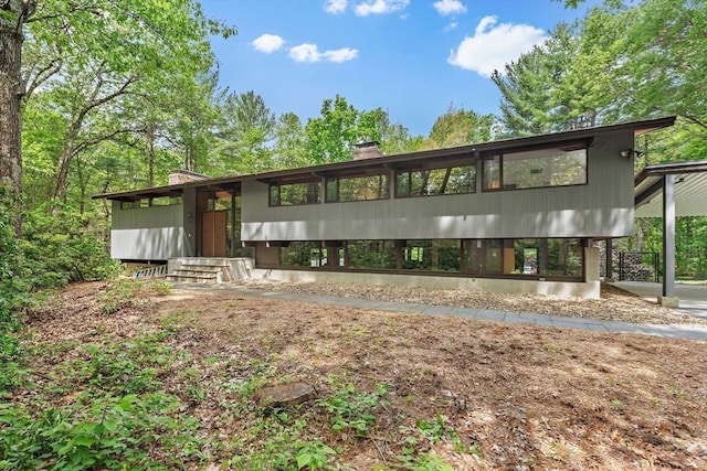 183 Indian Hl, Carlisle, MA 01741 - view of front facade with a chimney
