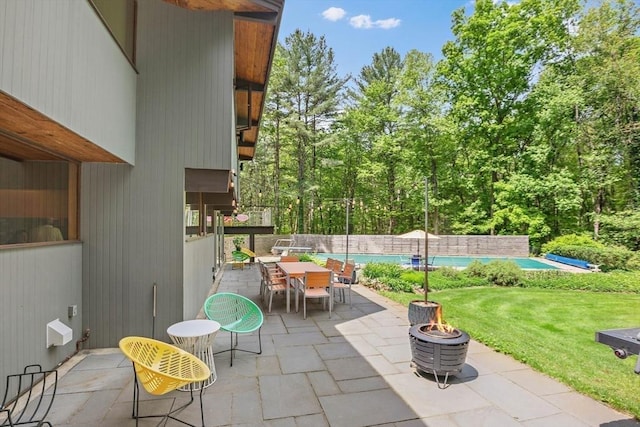 183 Indian Hl, Carlisle, MA 01741 - view of patio featuring a fire pit and outdoor dining area