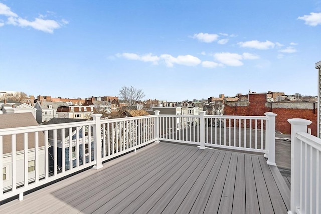 wooden deck featuring a residential view