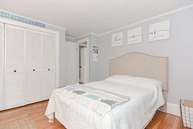 197 N St, Mattapoisett, MA 02739 - bedroom featuring wood finished floors, ornamental molding, and a closet
