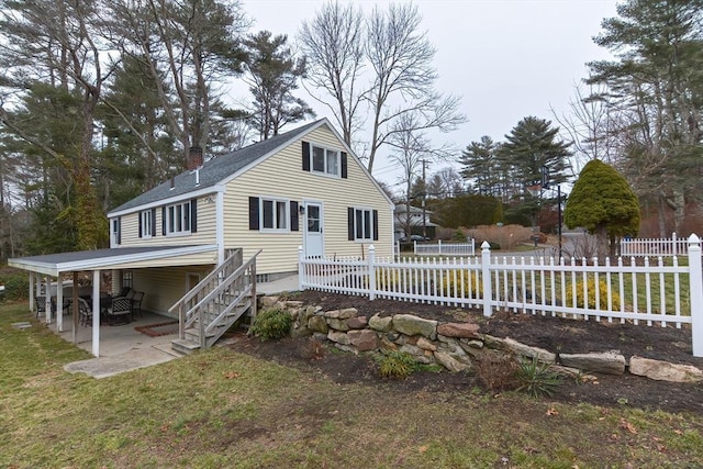 197 N St, Mattapoisett, MA 02739 - rear view of house with a patio area