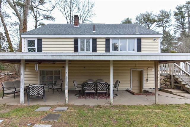 197 N St, Mattapoisett, MA 02739 - back of property featuring stairs, a patio, outdoor lounge area, and a chimney