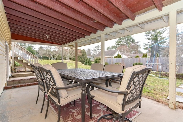 197 N St, Mattapoisett, MA 02739 - view of patio / terrace featuring stairs, fence, and outdoor dining space
