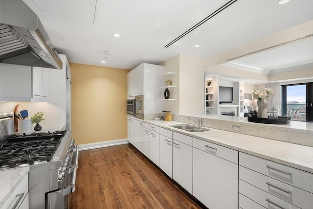 kitchen with a sink, open shelves, stainless steel appliances, white cabinets, and extractor fan