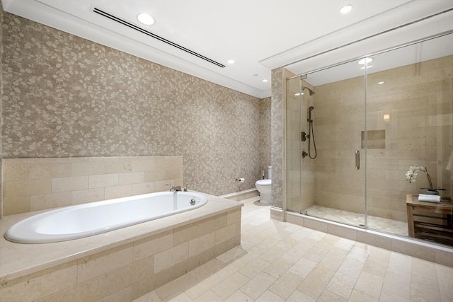 full bath featuring a garden tub, toilet, a stall shower, recessed lighting, and wallpapered walls