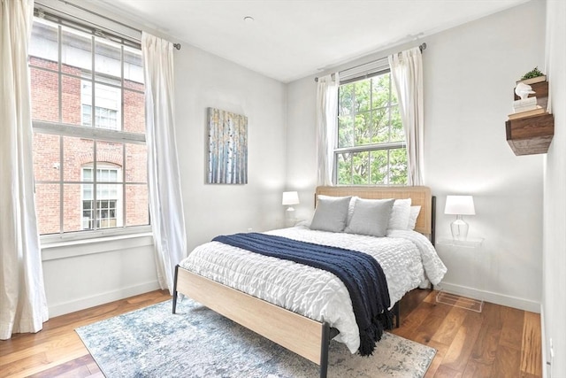 45 1st Ave Unit 301, Boston, MA 02129 - bedroom with wood finished floors and baseboards