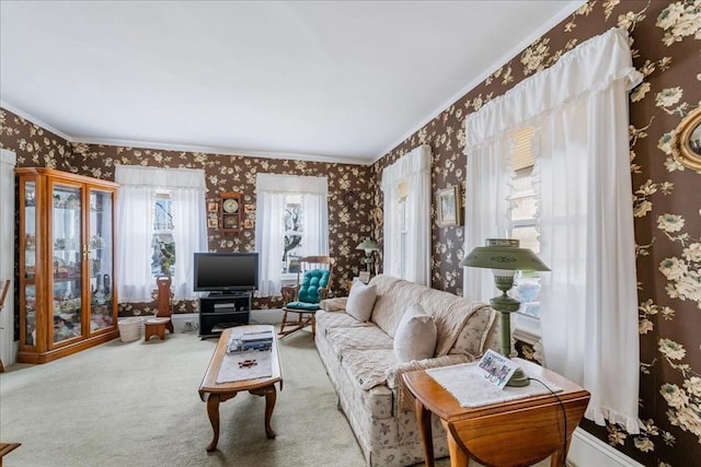 living room featuring carpet flooring and ornamental molding