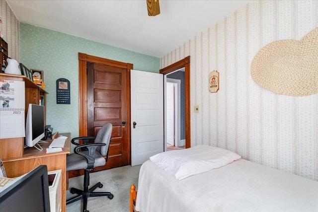 bedroom with ceiling fan and light colored carpet