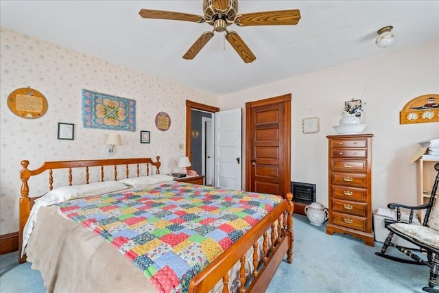 carpeted bedroom featuring ceiling fan