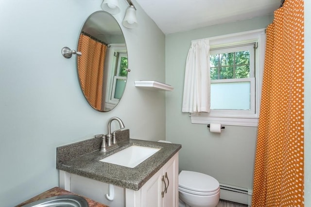 8 May St, Sharon, MA 02067 - bathroom with a baseboard heating unit and vanity