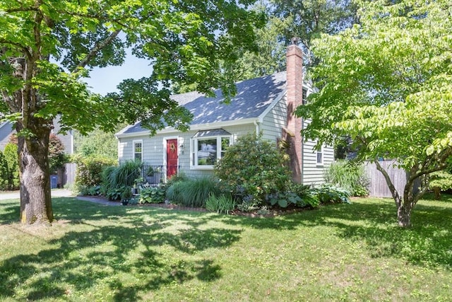8 May St, Sharon, MA 02067 - view of front of home featuring a chimney and a shingled roof