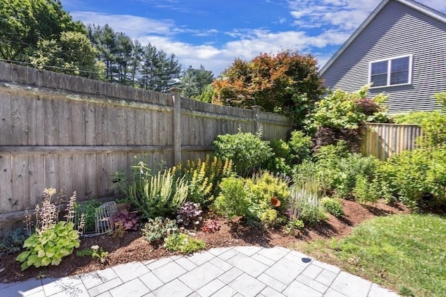 8 May St, Sharon, MA 02067 - fenced backyard featuring a patio