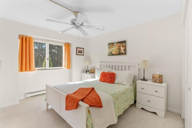 79 Chilton Ln Unit 79, Brewster, MA 02631 - bedroom with ceiling fan, light carpet, and baseboard heating