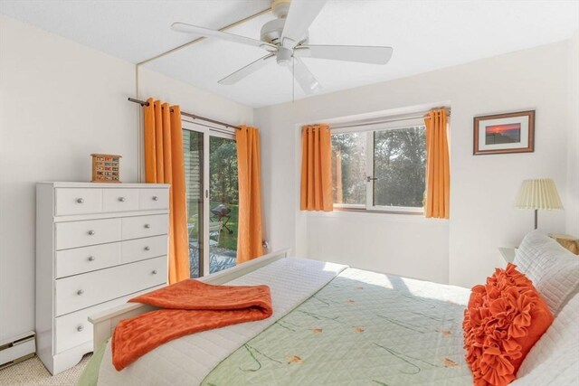 79 Chilton Ln Unit 79, Brewster, MA 02631 - bedroom with a baseboard radiator, ceiling fan, and light carpet