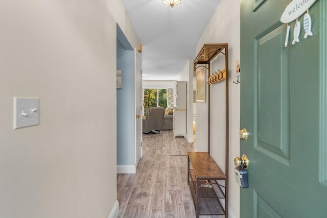 79 Chilton Ln Unit 79, Brewster, MA 02631 - hall featuring baseboards and wood finished floors
