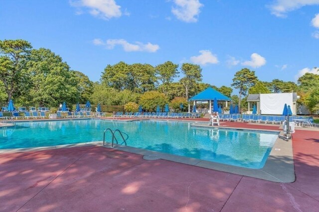 79 Chilton Ln Unit 79, Brewster, MA 02631 - community pool featuring a patio