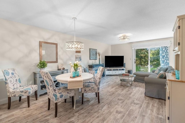 79 Chilton Ln Unit 79, Brewster, MA 02631 - dining space featuring light wood finished floors and baseboards