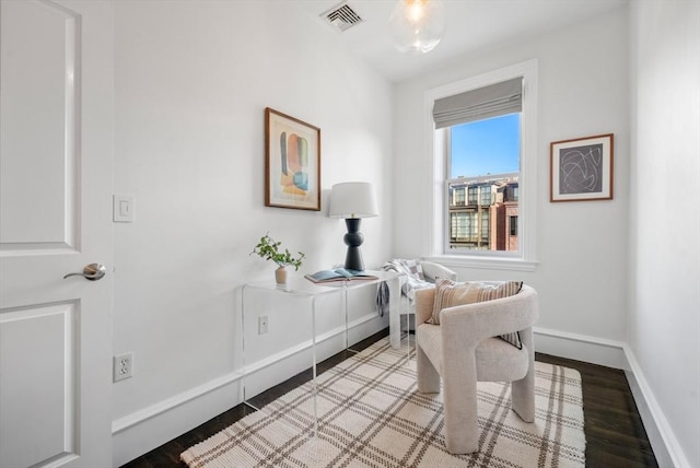 living area featuring hardwood / wood-style flooring