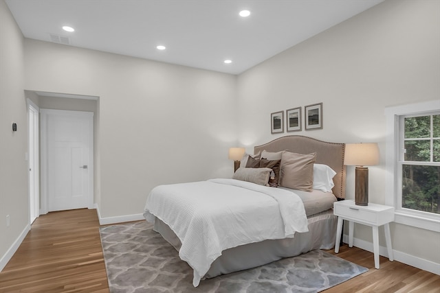 bedroom with light wood-type flooring