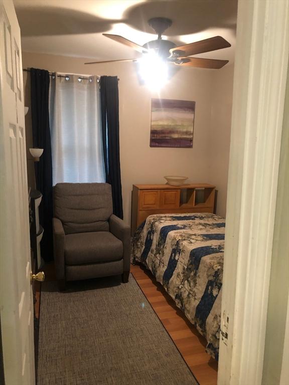 81 Bellevue Ave, Haverhill, MA 01832 - bedroom featuring light wood-type flooring and ceiling fan