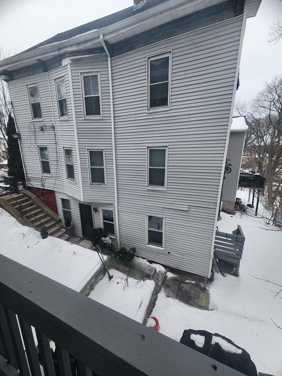 81 Bellevue Ave, Haverhill, MA 01832 - view of snowy exterior featuring a balcony