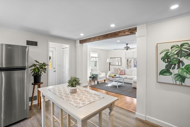 dining space featuring visible vents, recessed lighting, baseboards, and wood finished floors