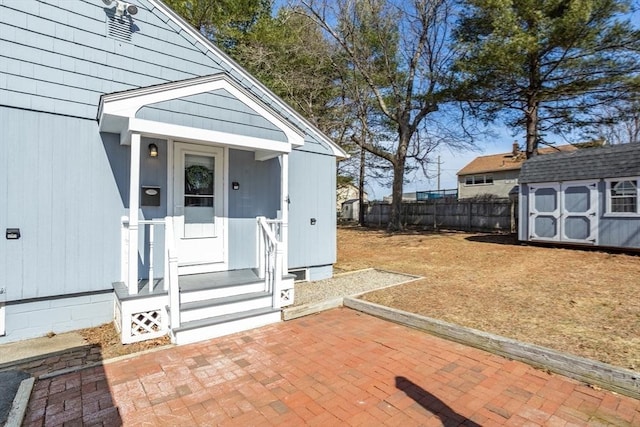 property entrance with fence